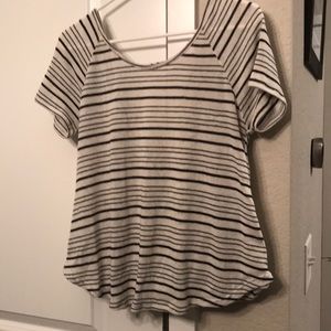 Soft white and black top with open back